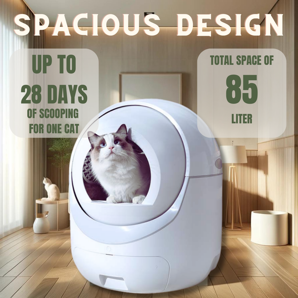 Spacious Design Cat Litter Box with a white color scheme. A cat is seen peeking out from the box, and text labels display 'UP TO 28 DAYS OF SCOOPING FOR ONE CAT' and 'TOTAL SPACE OF 85 LITER'. The box is set in a home interior with a wooden floor and a potted plant in the background